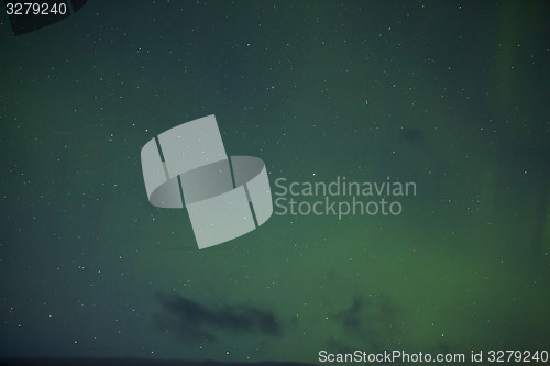 Image of Northern lights with bright stars in Iceland