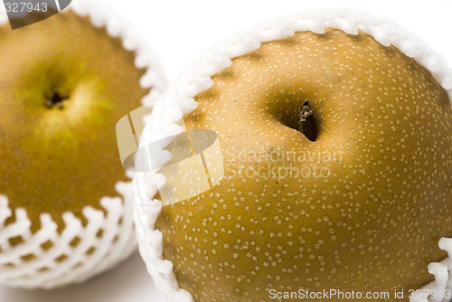 Image of asian pears in shipping net