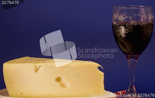 Image of swiss cheese and wine