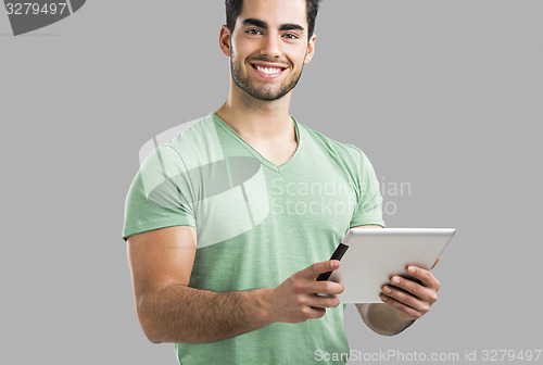 Image of Man working with a tablet, 