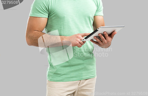 Image of Man working with a tablet, 