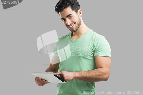 Image of Man working with a tablet, 