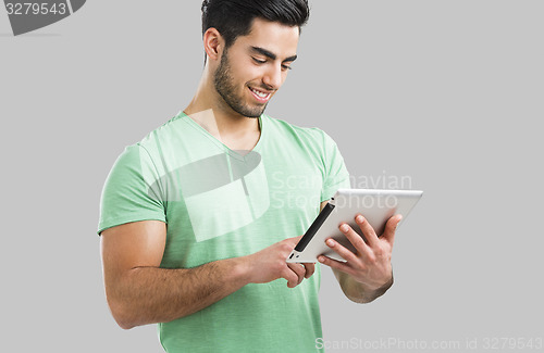 Image of Man working with a tablet, 