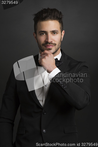 Image of Latin man wearing a tuxedo