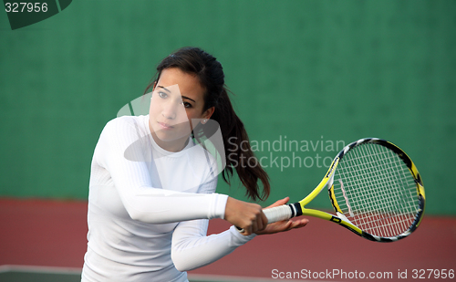Image of Girl playing tennis