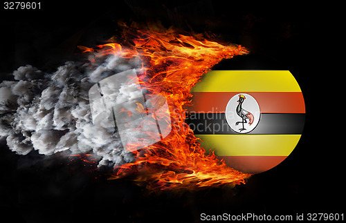 Image of Flag with a trail of fire and smoke - Uganda