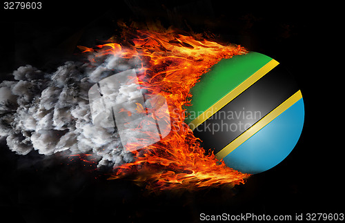 Image of Flag with a trail of fire and smoke - Tanzania