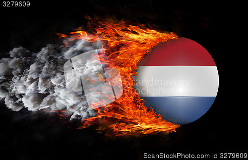 Image of Flag with a trail of fire and smoke - Netherlands