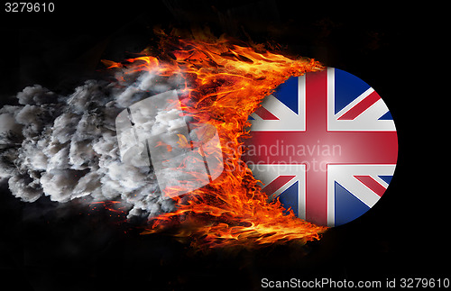 Image of Flag with a trail of fire and smoke - United Kingdom