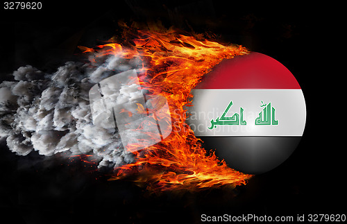 Image of Flag with a trail of fire and smoke - Iraq