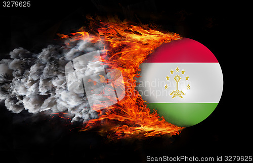 Image of Flag with a trail of fire and smoke - Tajikistan