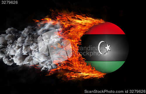 Image of Flag with a trail of fire and smoke - Libya