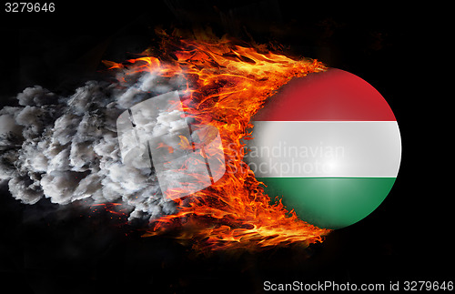 Image of Flag with a trail of fire and smoke - Hungary