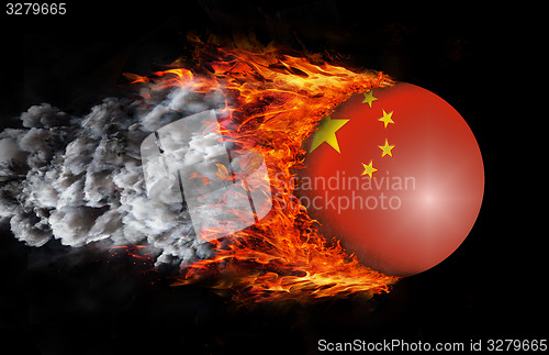 Image of Flag with a trail of fire and smoke - China