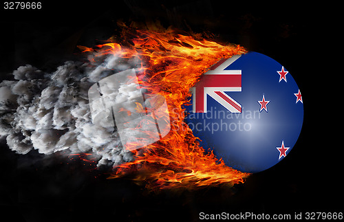 Image of Flag with a trail of fire and smoke - New Zealand