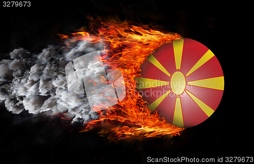 Image of Flag with a trail of fire and smoke - Macedonia