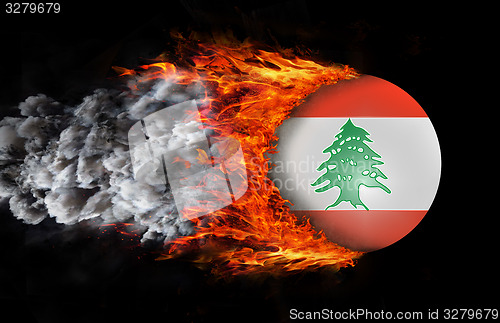 Image of Flag with a trail of fire and smoke - Lebanon