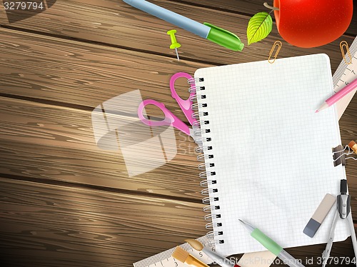 Image of School supplies on wooden background. EPS 10