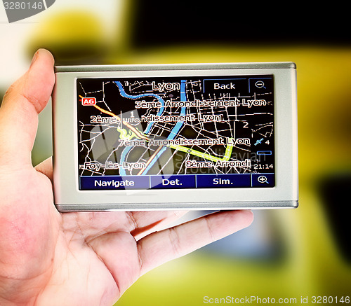 Image of Gps in a man hand.