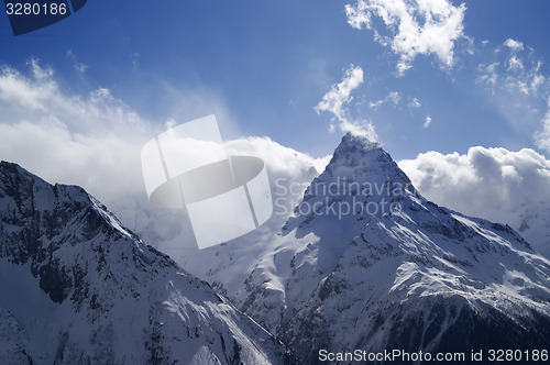 Image of Cloudy mountains at evening