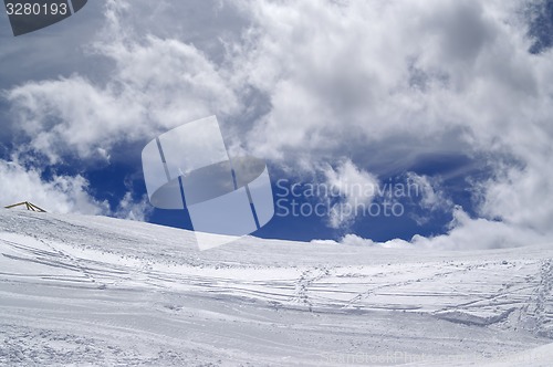 Image of Ski slope in sun wind day