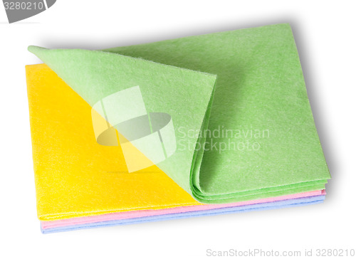 Image of Multicolored cleaning cloths folded on top