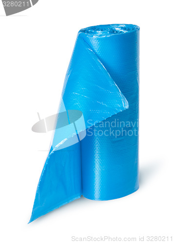 Image of Vertical roll of blue plastic garbage bags
