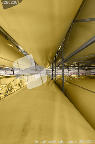 Image of Industrial interior with welded silos