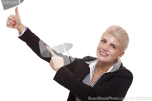 Image of Businesswoman Pointing Up While Looking at Camera