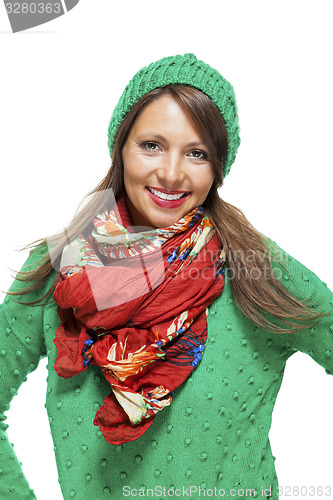 Image of Cute sexy young woman in a green winter outfit