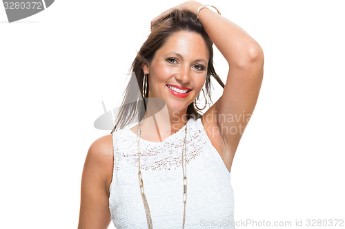 Image of Happy Woman in Trendy Outfit Holding her Hair Up