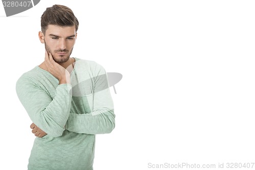 Image of young man in casual fashion on white