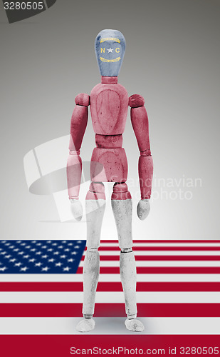 Image of Wood figure mannequin with US state flag bodypaint - North Carol