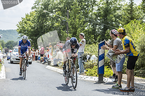 Image of Two Cyclist During a Time Trail - Tour de France 2014