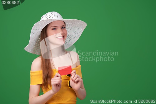 Image of Summer girl ing blank credit card