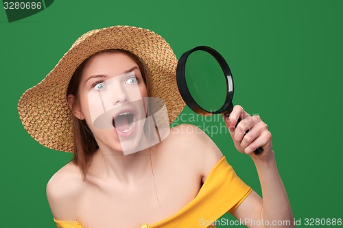 Image of Shocked surprised woman showing blank copy space