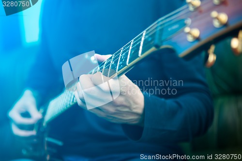Image of Electric guitar player