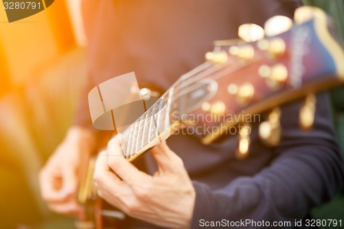 Image of Electric guitar player