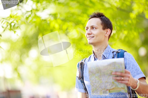 Image of Tourist with map. 