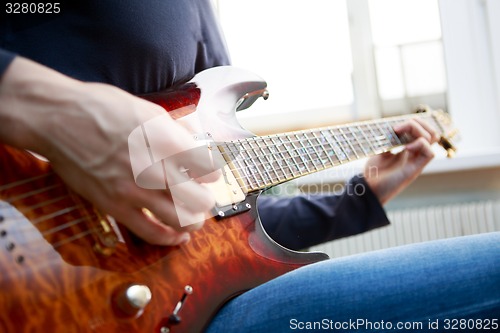 Image of Electric guitar player