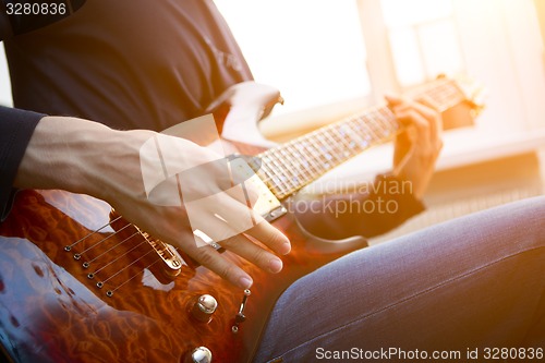 Image of Electric guitar player