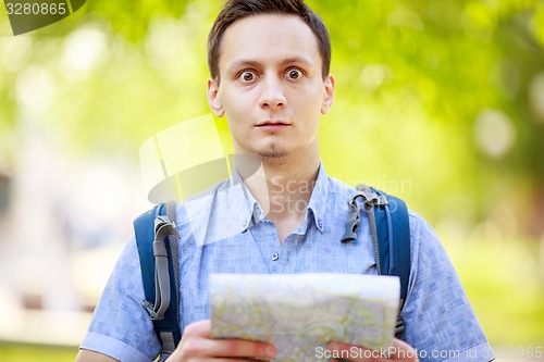 Image of Tourist with map. 