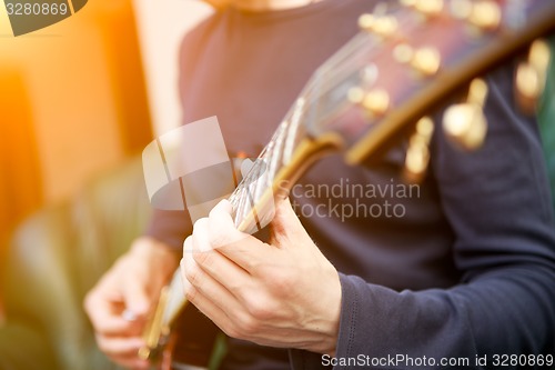 Image of Electric guitar player