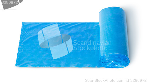 Image of Roll of blue plastic garbage bags top view