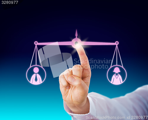 Image of Keeping A Female And Male Worker Balanced By Touch