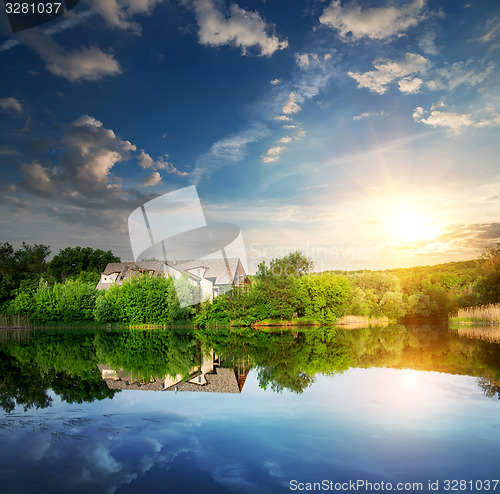 Image of Sunset over village