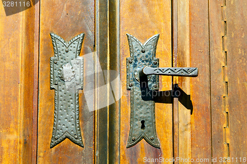 Image of castellanza blur lombardy   abstract    curch  closed wood cross