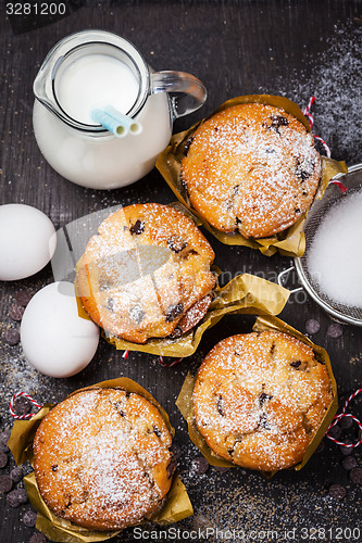 Image of Homemade muffins with baking ingredients