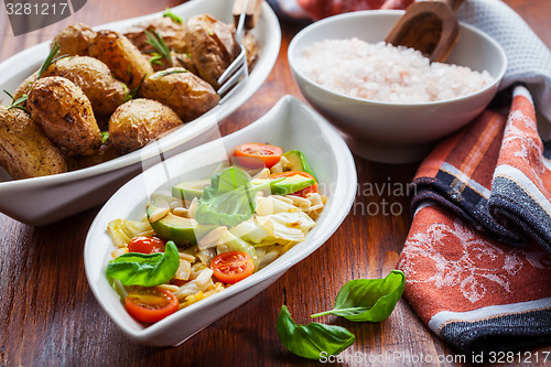 Image of Cabbage salad with avocado and oven potatoes 