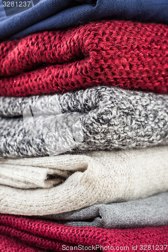 Image of Stack of handmade wool sweaters